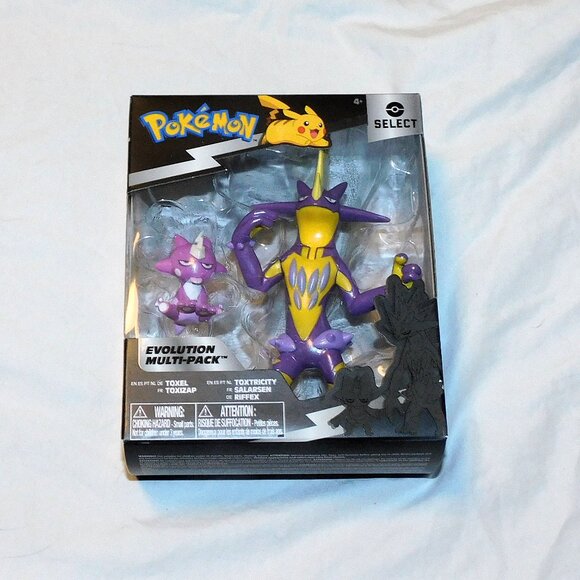 Pokemon Evolution Multi Pack Toxel & Toxtricity 2 Figures Purple Select NEW - Picture 1 of 3